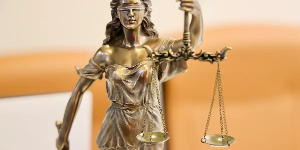 justice statue holding scales