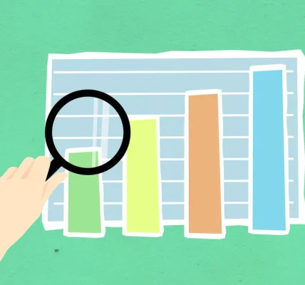 Magnifying glass over bar chart graphic