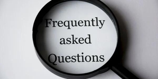 Magnifying glass over FAQ text