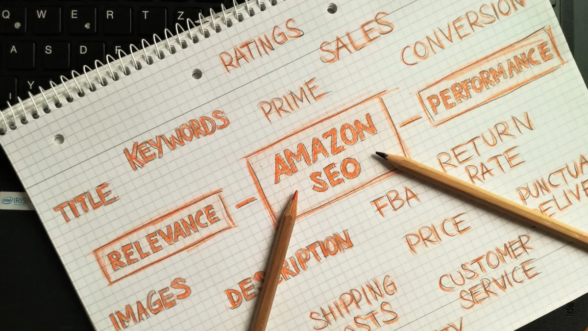 notebook page with handwritten SEO terms and pencils
