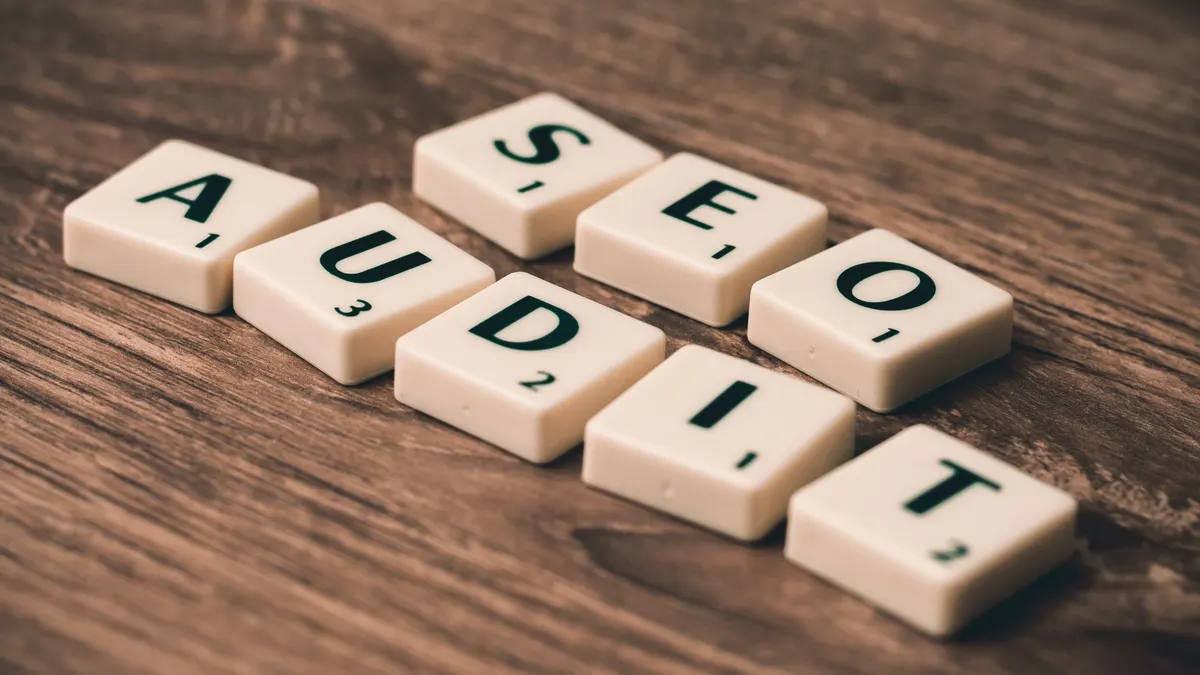 Surfer SEO review: how its content editor helps optimize pages for search — Seo Audit White Blocks on Brown Wooden Surfa